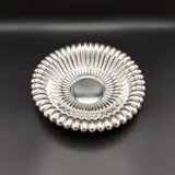 Lobed silver ...
